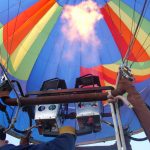 To make the most of the ride a hot air balloon safari is best when the weather is calmest and at sunrise