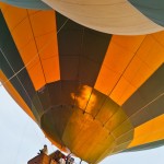 Temperature of the air in the balloon envelope is manipulated using burners fueled by butane gas