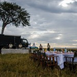 The breakfast that follows the hot-air balloon ride is set up typically under the shade of a single acacia tree
