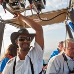 By expertly navigating the vertical landscape the hot-air balloon pilot finds some directional control