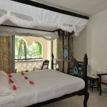 The Swahili atmosphere is enhanced by the Pili-Pili carved four-poster double beds in each of the rooms and Swahili easy chairs on the balconies