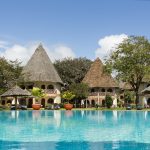 Main paradise view of chalets over pool