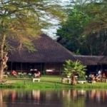 View of main restaurant from across the dam at Voyager Ziwani Tsavo