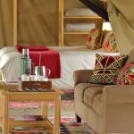 Pejeta bush camp family room showing both bedrooms and central lounge area