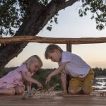 Rekero camp kids playing on deck